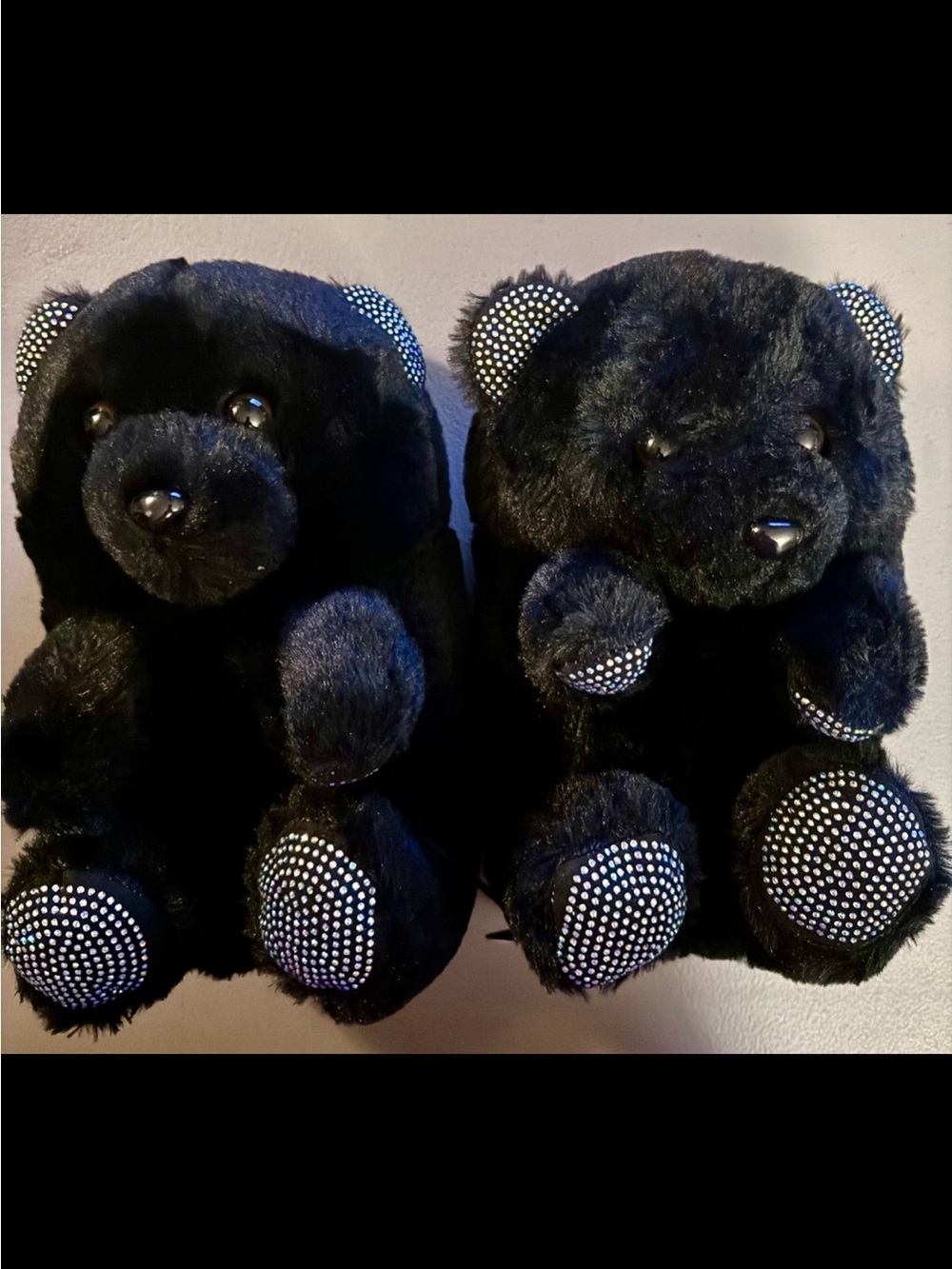 Black plush bear slippers with rhinestone details